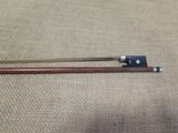 a close up of two wooden chopsticks sitting on top of a table