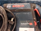 a tool in a box with a cord and a cord cutter