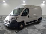 a picture of a white van parked in a room