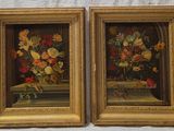 painting of flowers in a gold frame on a white background