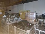 a large amount of boxes and crates in a warehouse