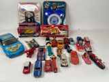 a lot of toy cars that are sitting on a table