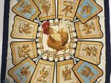 une image représentant un foulard carré orné d'un coq