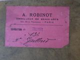 an old pink ticket with a picture of a woman ' s name on it