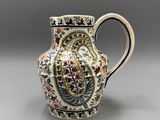 une image représentant un petit vase orné d'un motif floral