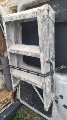 a truck that has a shelf in the back of it