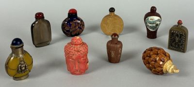 a lot of small bottles that are sitting on a table