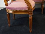 two chairs that are sitting next to each other