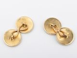 two pairs of gold plated cufflinks with a knot
