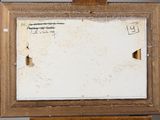 an old picture of a picture frame with a piece of paper on top of it