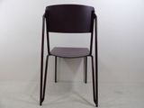 a black chair with a brown seat in a white room