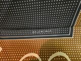 black and white polka dot print pocket square scarf with a logo on it