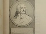 an old book with a drawing of a man in a suit