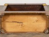 a wooden box that is sitting on the floor