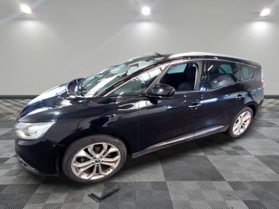 a picture of a black car in a showroom