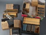 several boxes of assorted items sitting on top of a table