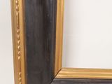 an image of a picture of a picture frame with a black and gold border