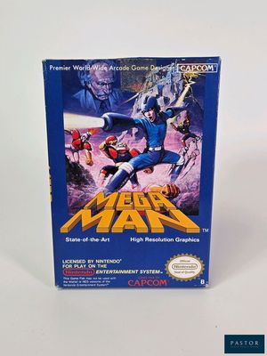 La boîte du jeu Mega Man est posée sur une surface blanche.