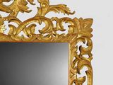a mirror that is sitting on the wall