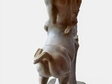 marble statue of a boy and a dog on a marble base