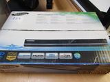 a box that has a dvd player inside of it