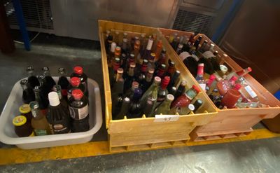 many bottles of wine in a wooden crate