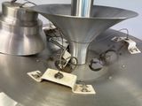 an image of a machine that has a funnel in it