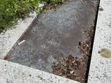 a concrete slab with a hole in the middle of it