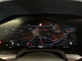 a close up of a car dashboard with a map on the screen