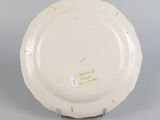 an image of a white plate sitting on top of a table
