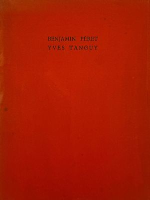 a red book with black writing on the cover