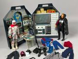 two action figures that are standing next to each other