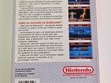 a close up of a nintendo game box with a video game on it