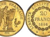 a gold coin with an image of an angel on it
