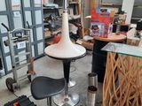 an image of a table and chairs in a garage