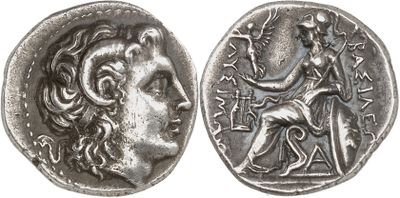 a silver coin with an image of a man and a woman on it