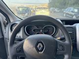 the dashboard of a car with a steering wheel and dashboard controls