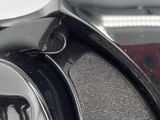a close up view of a car ' s headlight