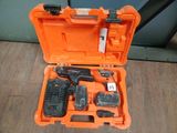 an orange tool case with tools in it on the floor