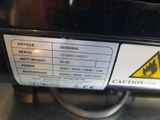 a close up of a caution sign on the back of a car