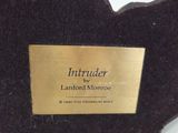 a picture of a plaque with a name on it