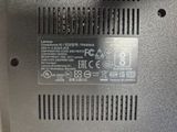 a close up of a laptop with a power button on it