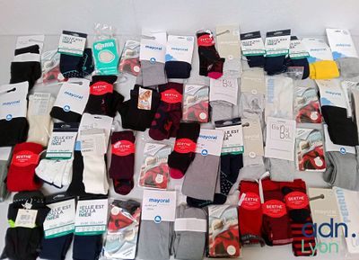 many pairs of men ' s socks on the table