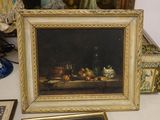 a picture of a painting on a table with a mirror in the background