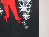 a picture of a paper cut of a woman in a red dress