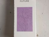 the box of a white and moisturizing body lotion sitting on a table