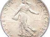 l'image d'une pièce de monnaie représentant une femme tenant une raquette de tennis