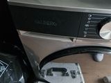 an image of a washer and dryer sitting next to each other
