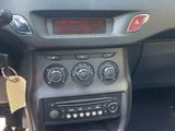 a dashboard of a car with a clock on it