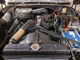 a car engine with a lot of wires and wires attached to it
